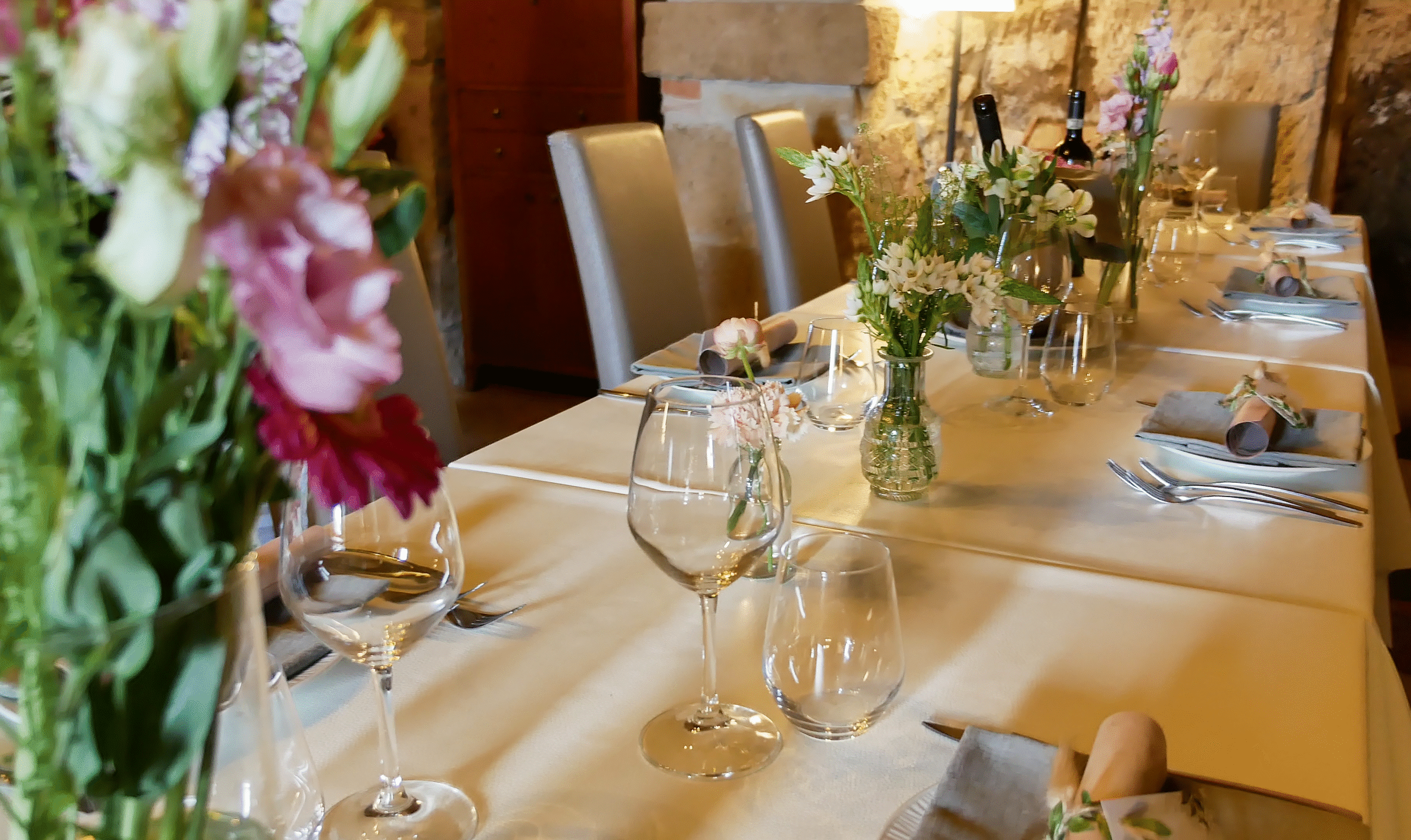 A reserved table in the tuff-stone dining rooms
