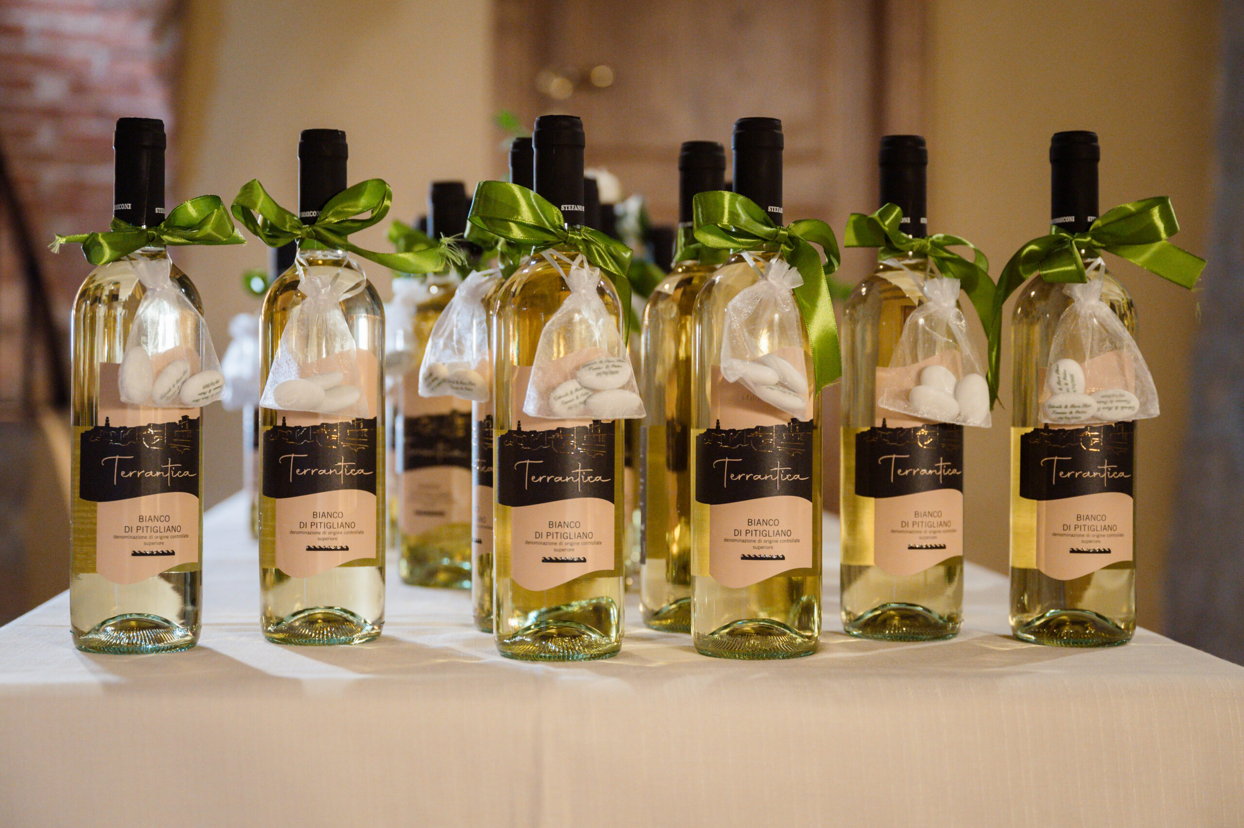Wine bottles presented as event favours